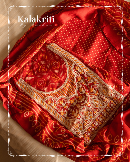 Gujri suit in a rich maroonish red hue with traditional bandhani print