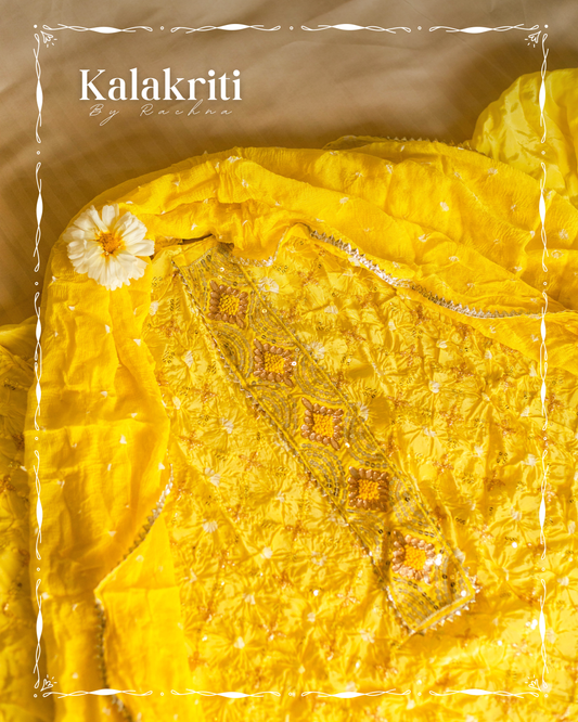 Pakistani silk suit piece in lemon yellow with a graceful crinkled texture